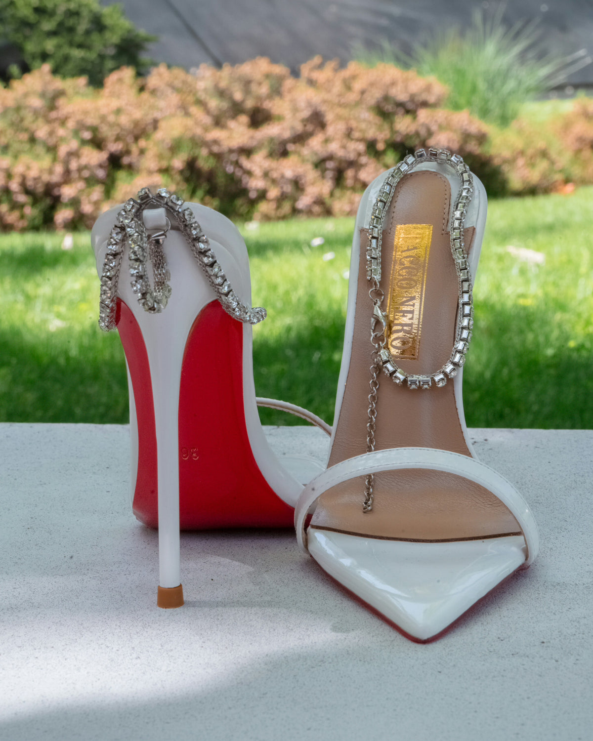 Hanna white strappy sandals with chain